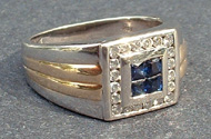 Tammy's Jewelry and Gem Box. Gold ring with saphires and diamonds.
