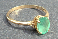 Tammy's Jewelry and Gem Box. Gold ring with emerald.