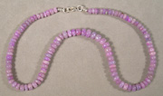 Lavender sugilite rondelle beads.