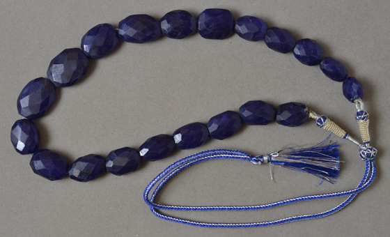 Sapphire faceted flat oval gemstone bead strand